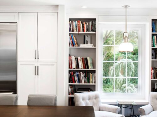 A beautiful and functional kitchen design featuring built-in refrigeration and plenty of storage, perfect for a kitchen remodel.