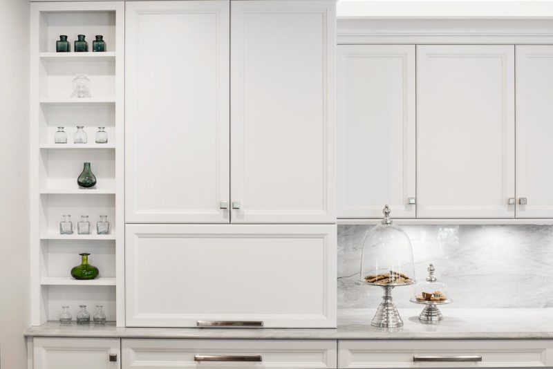 Beautiful functional Tulsa kitchen with white counter top, backsplash, white kitchen cabinet tall storage Kitchen Ideas Tulsa kitchen remodel