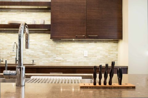 Contemporary bamboo cabinet kitchen, island Galley Workstation, recessed knife block, undermount sink, open shelves Tulsa kitchen design and remodel