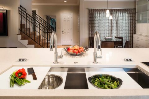 Galley Workstation kitchen remodel large kitchen island with quartz counter-top and induction cooktop Tulsa kitchen design and remodel
