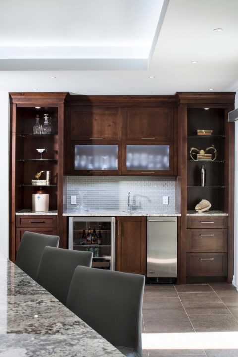 Kitchen beverage space shelves, undercounter wine refrigerator, ice maker, wall cabinet storage, frosted glass door fronts, granite counter-top, open shelves Kitchen Ideas Tulsa kitchen design remodel