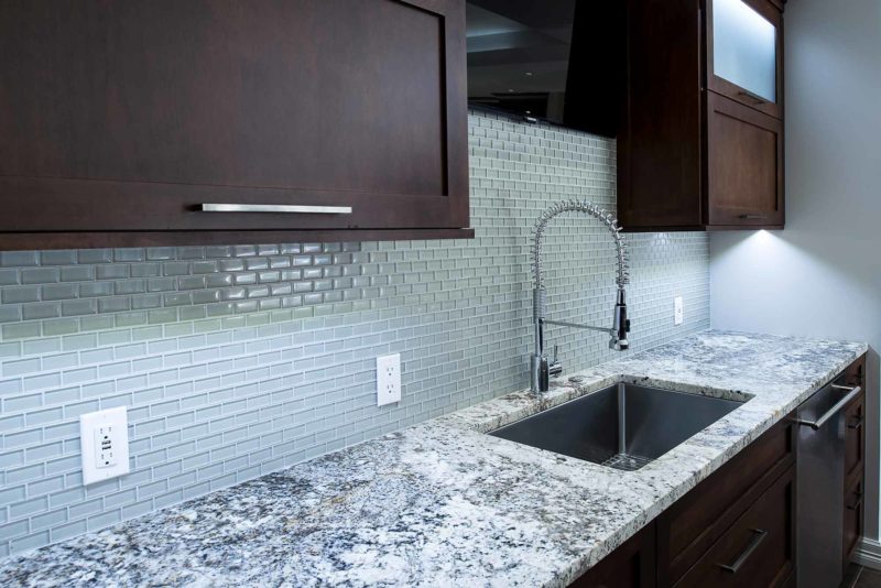 Kitchen clean-up sink, ceramic tile backsplash, granite counter top, pull-up wall cabinet storage Kitchen Ideas Tulsa kitchen remodel
