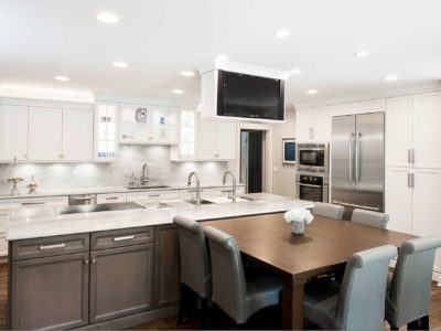 Kitchen island with table seating Galley Workstation, ceiling mount television, white kitchen cabinets Kitchen Ideas Tulsa kitchen remodel