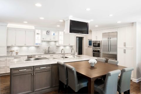 Kitchen island with table seating Galley Workstation, ceiling mount television, white kitchen cabinets Kitchen Ideas Tulsa kitchen remodel