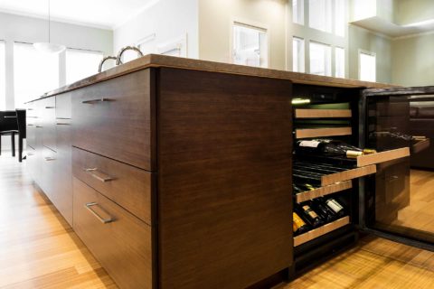 Tulsa kitchen bamboo island with wine refrigerator, base drawer storage, wood flooring Kitchen Ideas Tulsa kitchen design and remodel