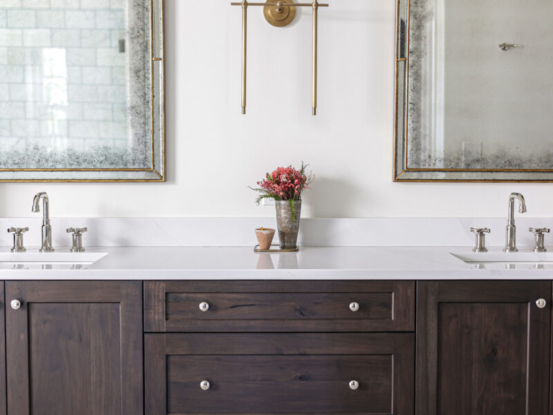 A custom Tulsa master bathroom design and remodel featuring double vanity sinks with ample cabinet storage.