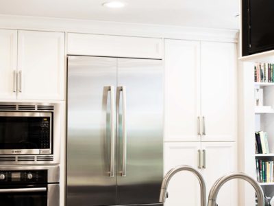 Stainless refrigeration and ovens, tall cabinet storage, Galley Workstation Kitchen Ideas Tulsa kitchen design and remodel
