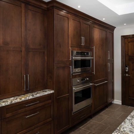 Tulsa kitchen tall pantry storage, GE Monogram microwave and oven, pull-out base storage, brown cabinets Kitchen Ideas Tulsa kitchen remodel