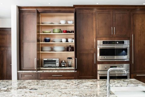 Tulsa kitchen design storage GE Monogram microwave oven, brown cabinet storage, molding to ceiling Kitchen Ideas Tulsa kitchen remodel
