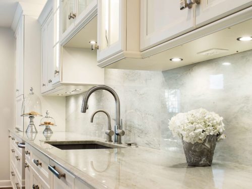 Undermount clean-up kitchen sink and cabinet storage, marble backsplash, puck lighting Kitchen Ideas Tulsa kitchen design and remodel