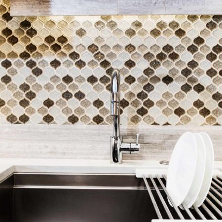 Clean-up kitchen sink with decorative tile backsplash quartz counter-top Kitchen Ideas Tulsa kitchen design and remodel