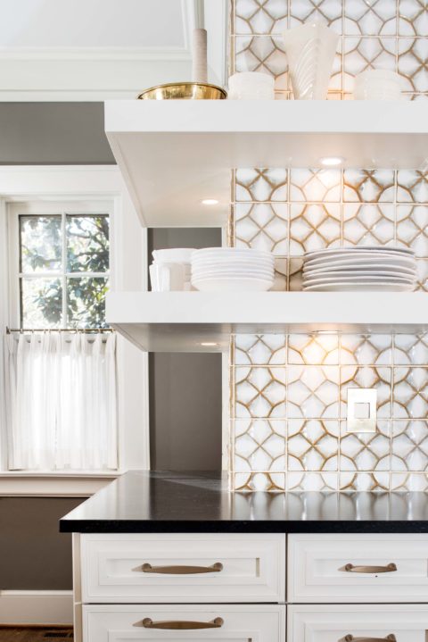 Open kitchen shelves Ann Sacks Nottingham tile open shelves for plates, black counters Kitchen Ideas Tulsa kitchen design and remodel