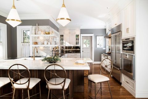 Midtown tulsa kitchen remodel Galley Workstation island seating, pendant lights, refinished wood floors, decorative Ann Sacks backsplash, professional appliances Tulsa kitchen remodel