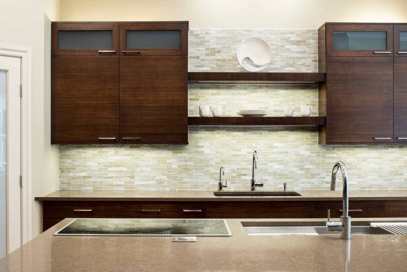 Walnut Galley 3 contemporary kitchen with Galley Workstation kitchen sink and induction cooking and cleanup kitchen sink with open shelves above