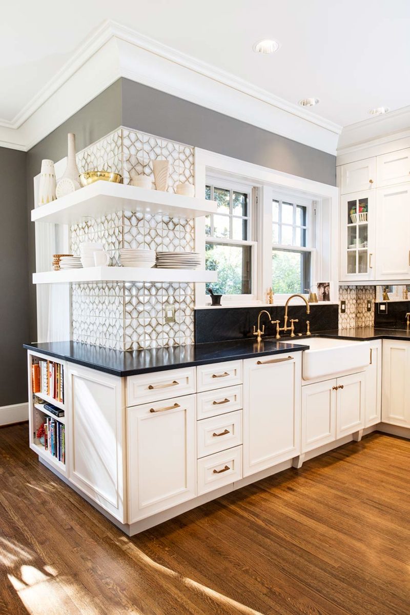 Beautiful midtown Tulsa kitchen with farmhouse cleanup kitchen sink, Ann Sacks Nottingham tile backsplash, open shelving and maple cabinets with melted brie painted finish