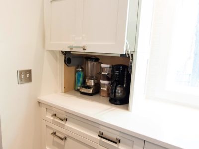 Elegant open Tulsa kitchen remodel with a white cabinet coffee and beverage with storage space and quartz counter top