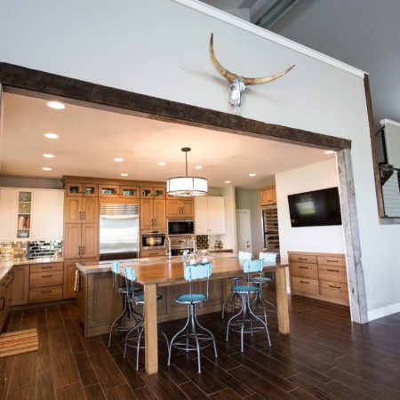 Open ranch kitchen remodel entry, dining living space, large island seating, kitchen cabinet storage Tulsa kitchen design and remodel
