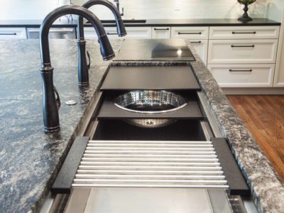 Galley Workstation granite island, induction cooktop, white cabinet storage, undermount sink, tile backsplash Kitchen Ideas Tulsa kitchen remodel