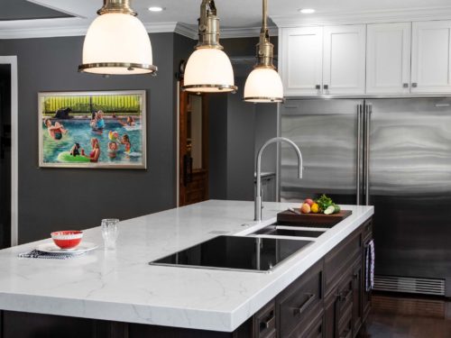 Kitchen island induction cooktop, pendant lights, Galley Workstation, Kitchenaid and Electrolux appliances Tulsa kitchen design and remodel