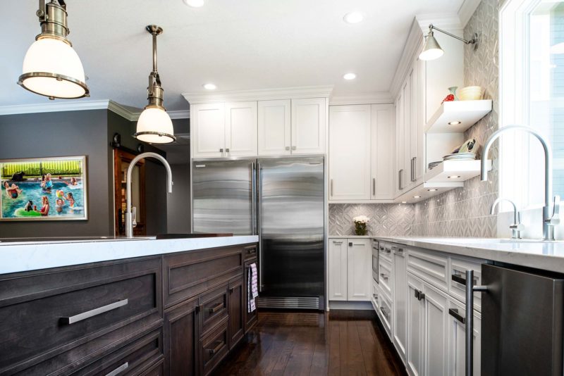 Large kitchen island base drawer storage, Electrolux stainless full-size refrigerator freezer, Galley Workstation, clean-up sink, open shelves, pendant lights Tulsa kitchen remodel