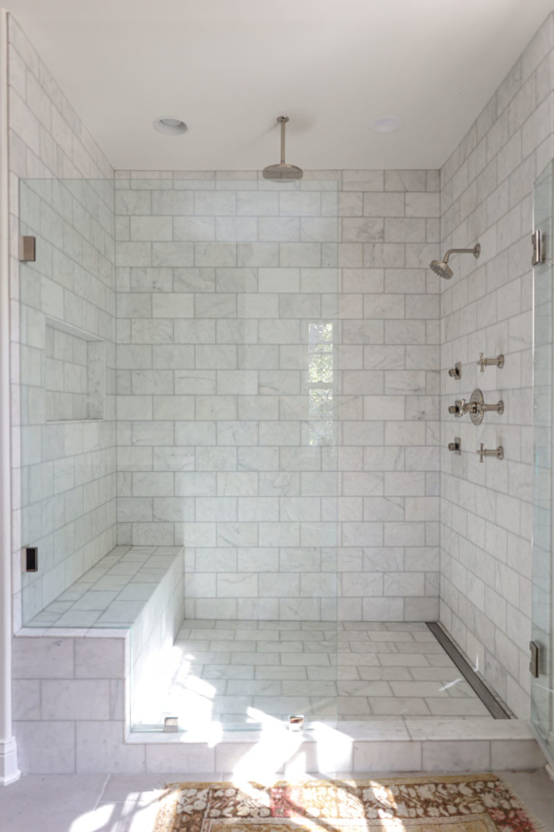 Tulsa master bathroom shower with rainfall shower head curb, shower bench, subway tile Kitchen Ideas Tulsa bathroom design and remodel