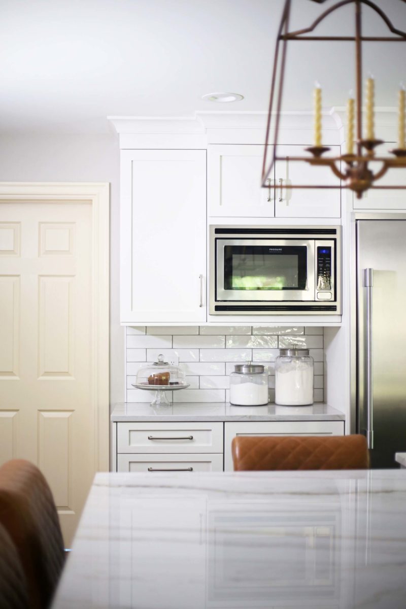 Wall microwave kitchen cabinet, drawer storage, refrigerator, subway tile backsplash, island pendants Kitchen Ideas Tulsa kitchen remodel