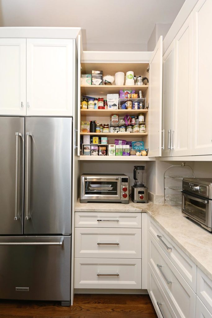 Timeless elegant large south Tulsa kitchen with walk-in pantry storage, stainless french door refrigerator/freezer, wall storage for spices and counter-top toaster oven