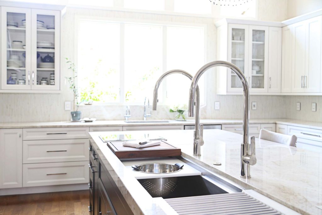 Tulsa kitchen with Galley Workstation, clean-up kitchen sink and glass wall cabinet storage