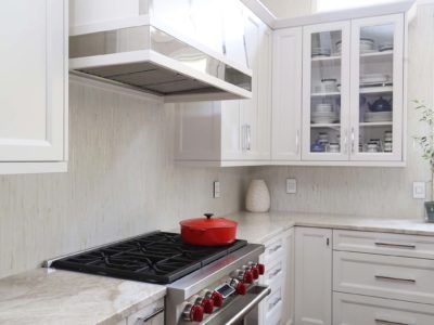 Professional kitchen gas range, decorative tile backsplash, glass panel wall white cabinet storage, base drawer storage Kitchen Ideas Tulsa kitchen remodel