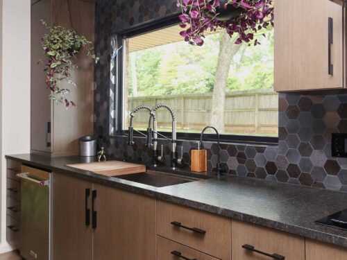 Base kitchen sink cabinet storage, stainless dishwasher, Galley sink workstation, refinished wood flooring, decorative tile backsplash Kitchen Ideas Tulsa kitchen design remodel