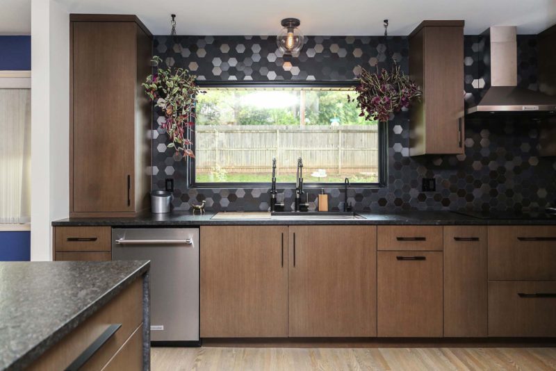 Flat panel kitchen cabinets, stainless dishwasher, Galley Workstation, decorative tile backsplash, stainless canopy vent hood, induction cooktop Kitchen Ideas Tulsa kitchen design and remodel