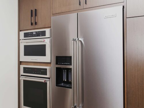 Tall kitchen pantry storage, KitchenAid stainless ovens, freezer refrigerator Kitchen Ideas Tulsa kitchen design and remodel