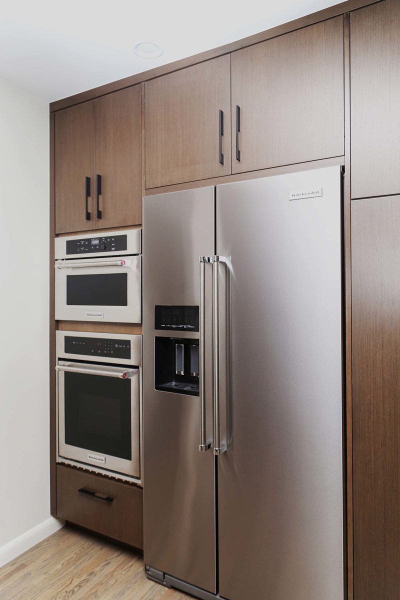 Tall kitchen pantry storage, KitchenAid stainless ovens, freezer refrigerator Kitchen Ideas Tulsa kitchen design and remodel