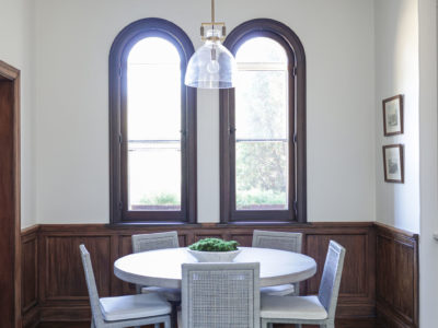 Breakfast dining area with table pendant light and wood floors Tulsa kitchen design remodel