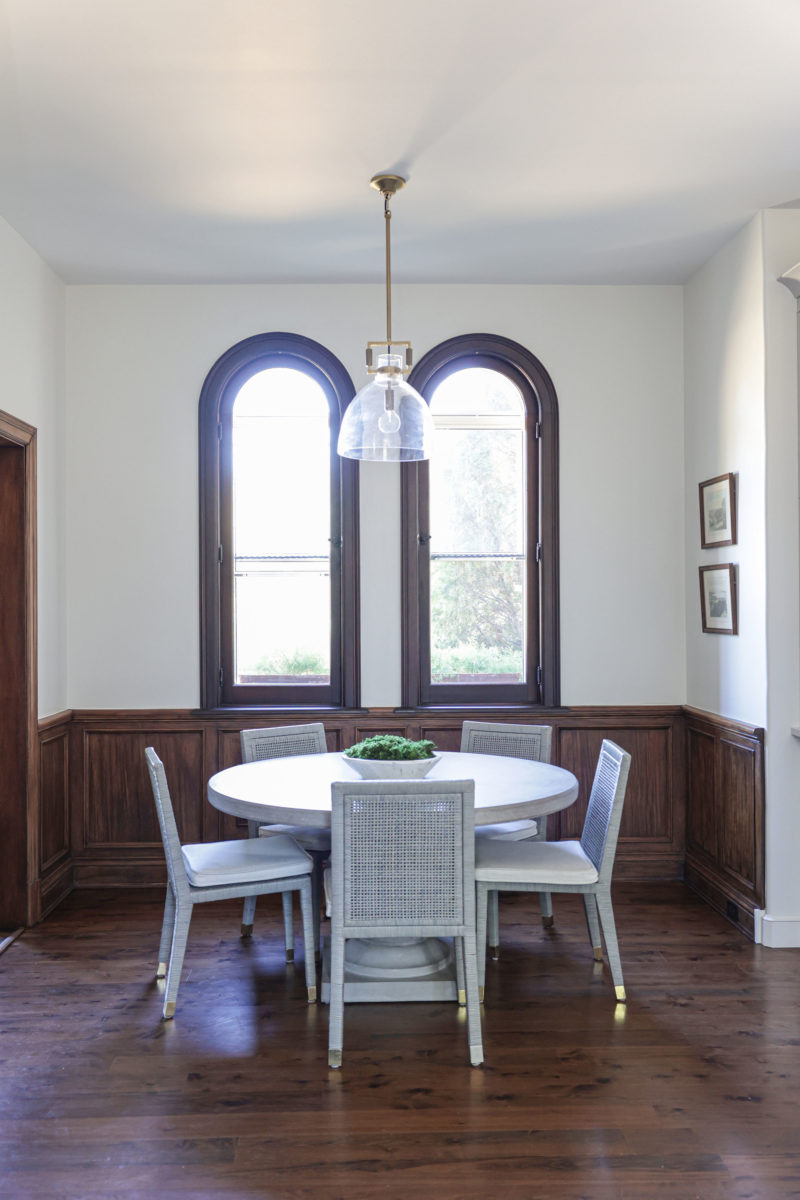 Breakfast dining area with table pendant light and wood floors Tulsa kitchen design remodel