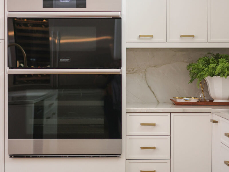 Dacor ovens with white cabinets, base and wall storage, counter backsplash Kitchen Ideas Tulsa kitchen remodel