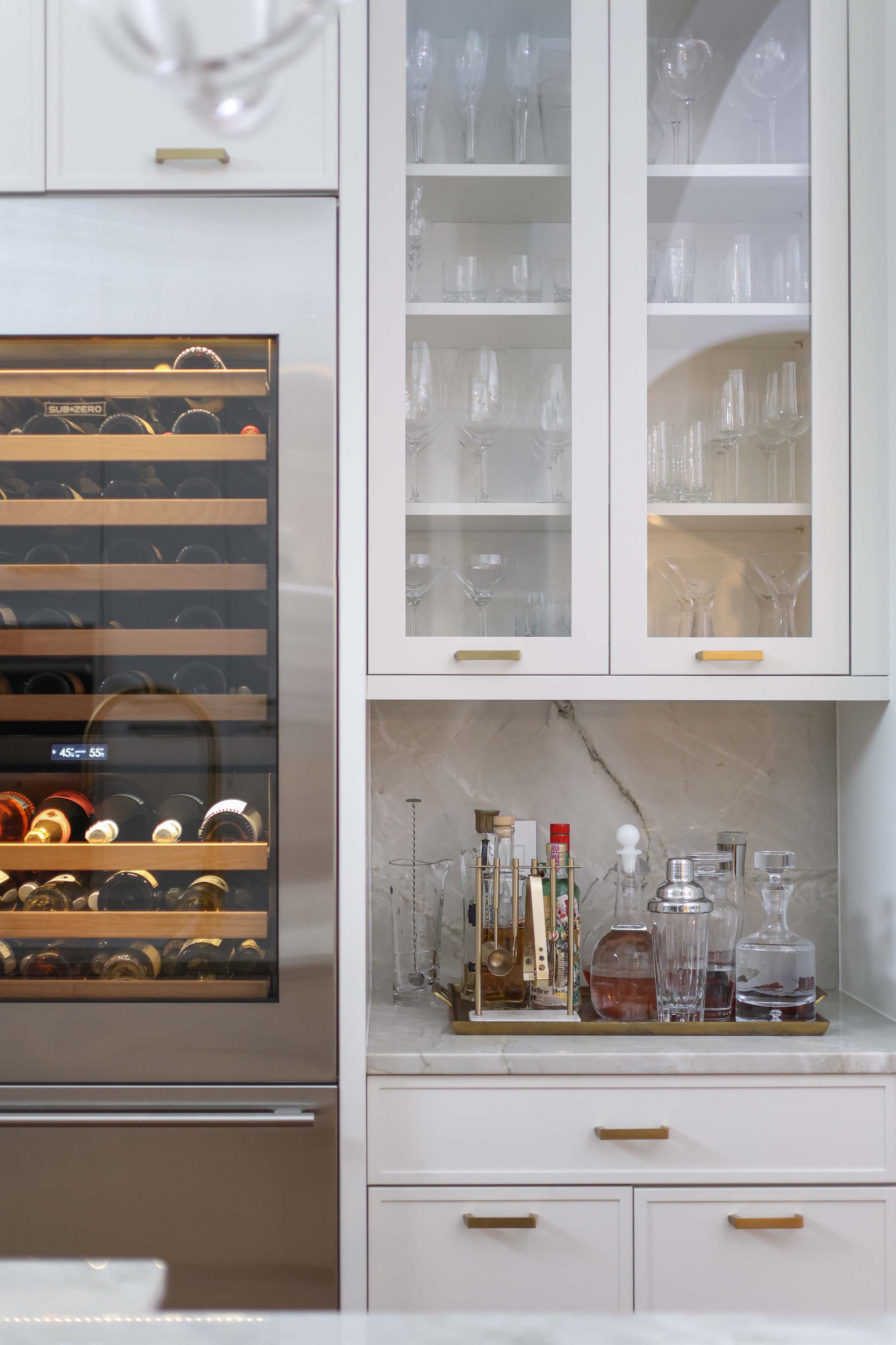 Sub-zero wine refrigerator, white cabinet base wall beverage bar storage Kitchen Ideas Tulsa kitchen design and remodel