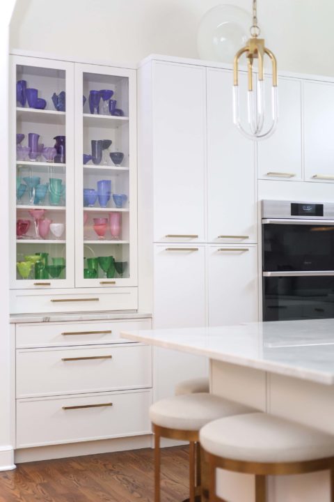 White tall pantry storage with glass front doors, Dacor ovens, island seating Kitchen Ideas Tulsa kitchen design and remodel