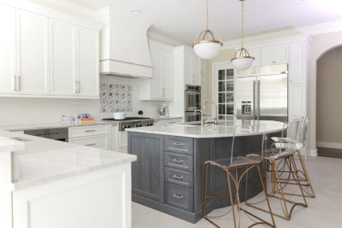 Big kitchen island cabinet storage pendant lights seating decorative hood rangetop, Jenn-air, Kitchenaid appliances, arched opening Kitchen Ideas Tulsa kitchen design remodel