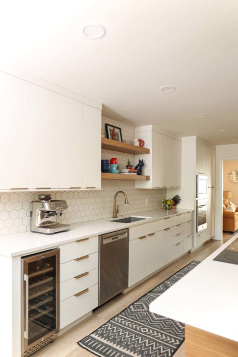Tulsa kitchen remodel storage drawers, white counters, undercounter beverage refrigerator, dishwasher, undermount sink, floating shelves Kitchen Ideas Tulsa kitchen remodel
