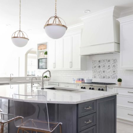 Kitchen island seating, decorative pendants, undermount kitchen sink, rangetop, decorative vent hood, white Kitchen Ideas Tulsa kitchen remodel