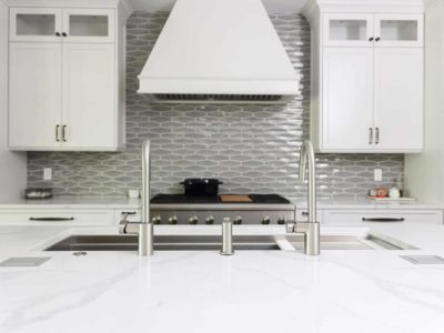 Tuxedo kitchen Galley Workstation, gas rangetop, vent hood, decorative tile backsplash Tulsa kitchen design and remodel