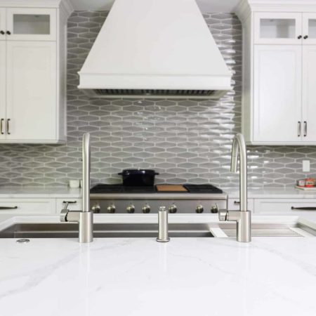 Tuxedo kitchen Galley Workstation, gas rangetop, vent hood, decorative tile backsplash Tulsa kitchen design and remodel