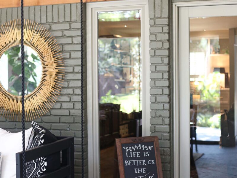 Spacious open-concept patio featuring entry door access in modern design remodel.